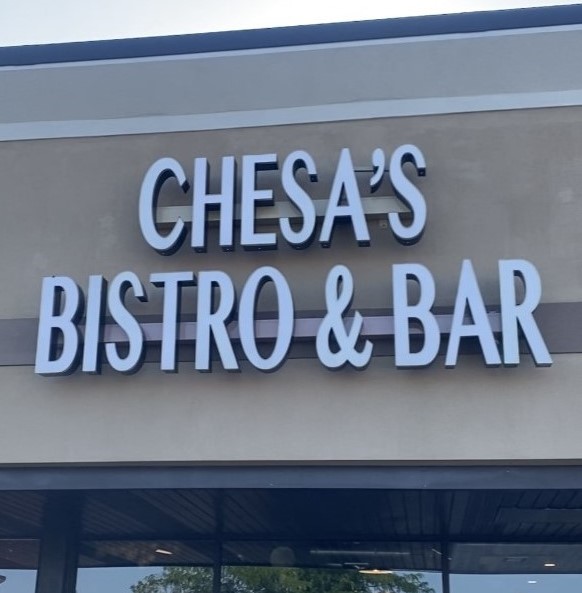 image of the sign outside of CheSa’s Bistro and Bar in Chicago, Illinois that reads 