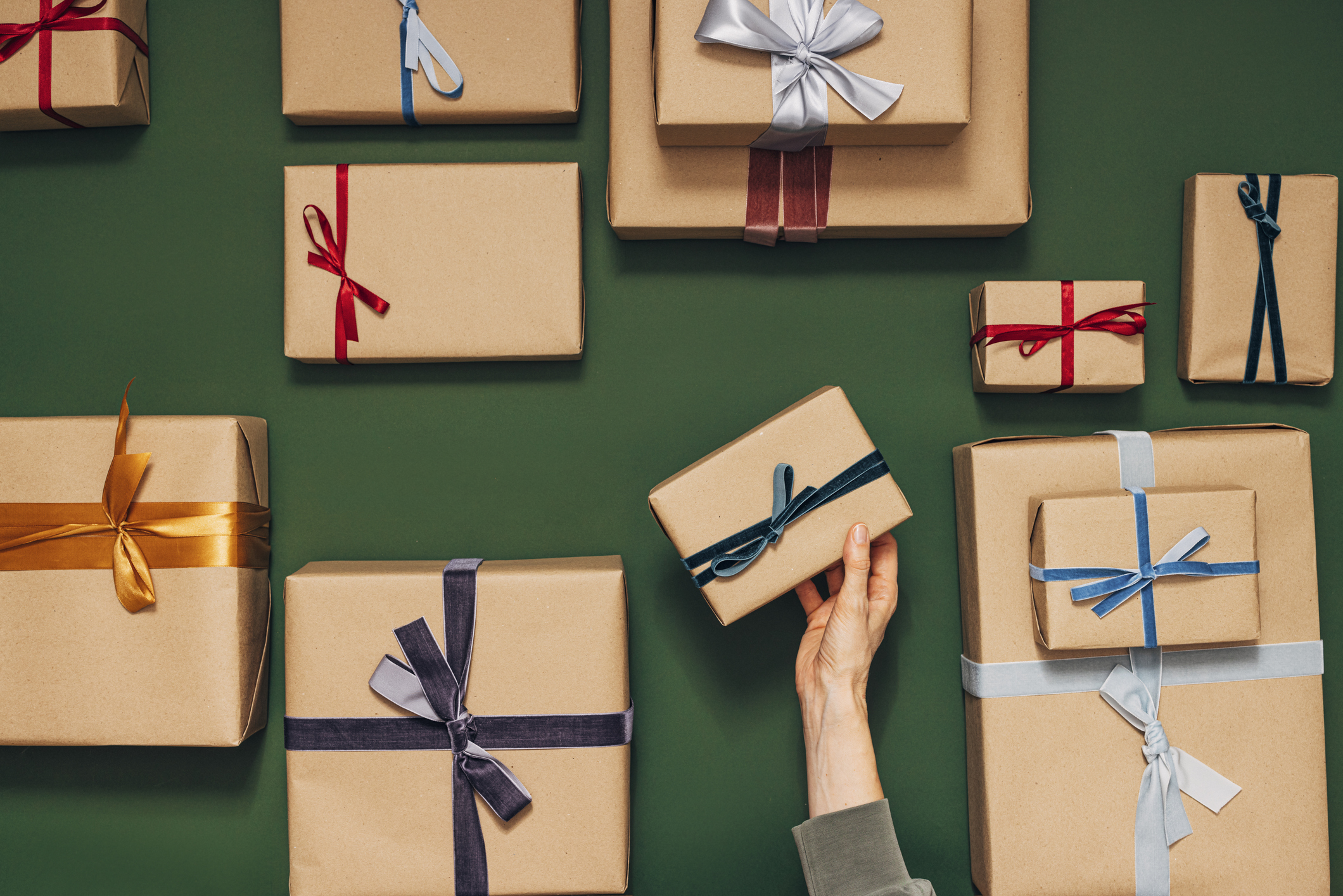 various sizes of gifts on a green background